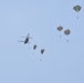 25th Infantry Division jump from a CH-47 Chinook helicopter during airborne training