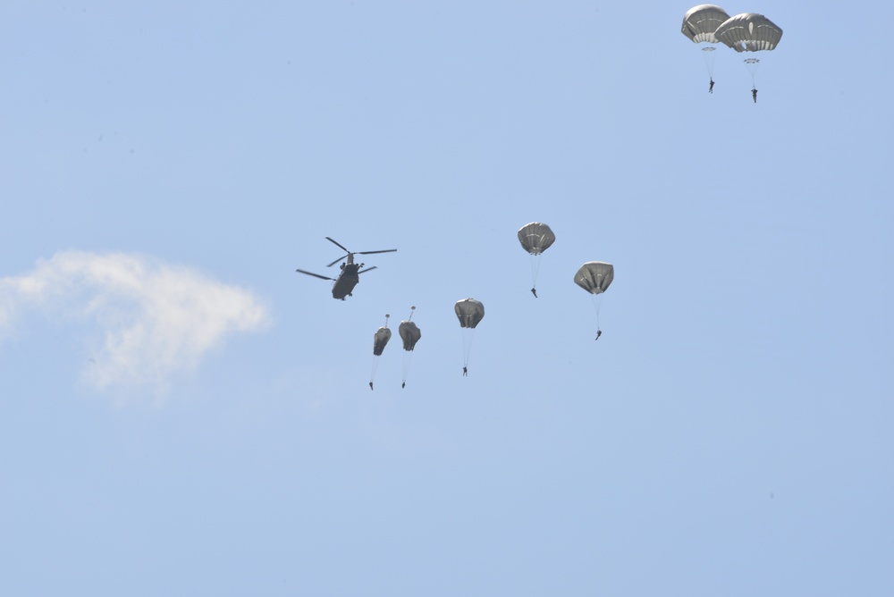 25th Infantry Division jump from a CH-47 Chinook helicopter during airborne training