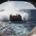 USS Wasp (LHD 1) and (NBU) 7 conduct Landing Craft, Air Cushion (LCAC) operations at sea