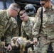 Medics of the headquarters company practice cold and hot load training aboard Blackhawk
