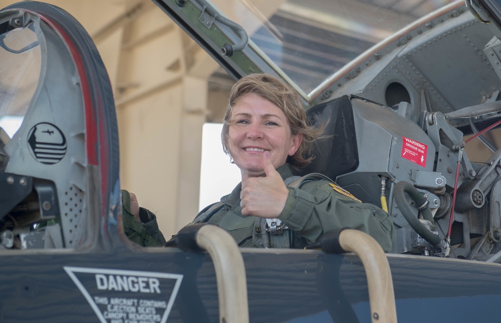 Chief Master Sergeant Katie McCool gives a thumbs up after her Incentive Flight