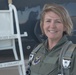 Chief Master Sergeant Katie McCool poses in front of the T-38 Trainer Aircraft after her Incentive Flight