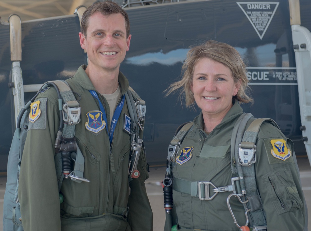 Captain Michael &quot;Gunn&quot; Harencak and Chief Master Sergeant Katie McCool pose in front of the T-38 Trainer Aircraft after Chief McCool's Incentive Flight