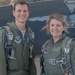 Captain Michael &quot;Gunn&quot; Harencak and Chief Master Sergeant Katie McCool pose in front of the T-38 Trainer Aircraft after Chief McCool's Incentive Flight