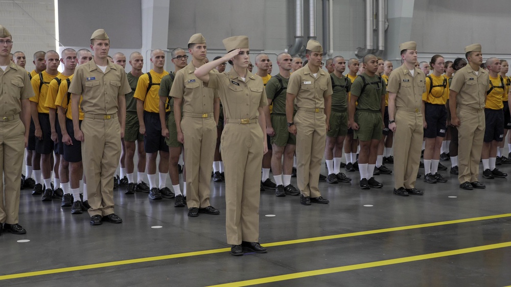 LAKES, Ill. (Nov. 14, 2017) Recruits march down a street at Recruit  Training Command (RTC) while wearing the Navy Working Uniform (NWU) Type  III uniforms. The new camouflage uniforms started being issued