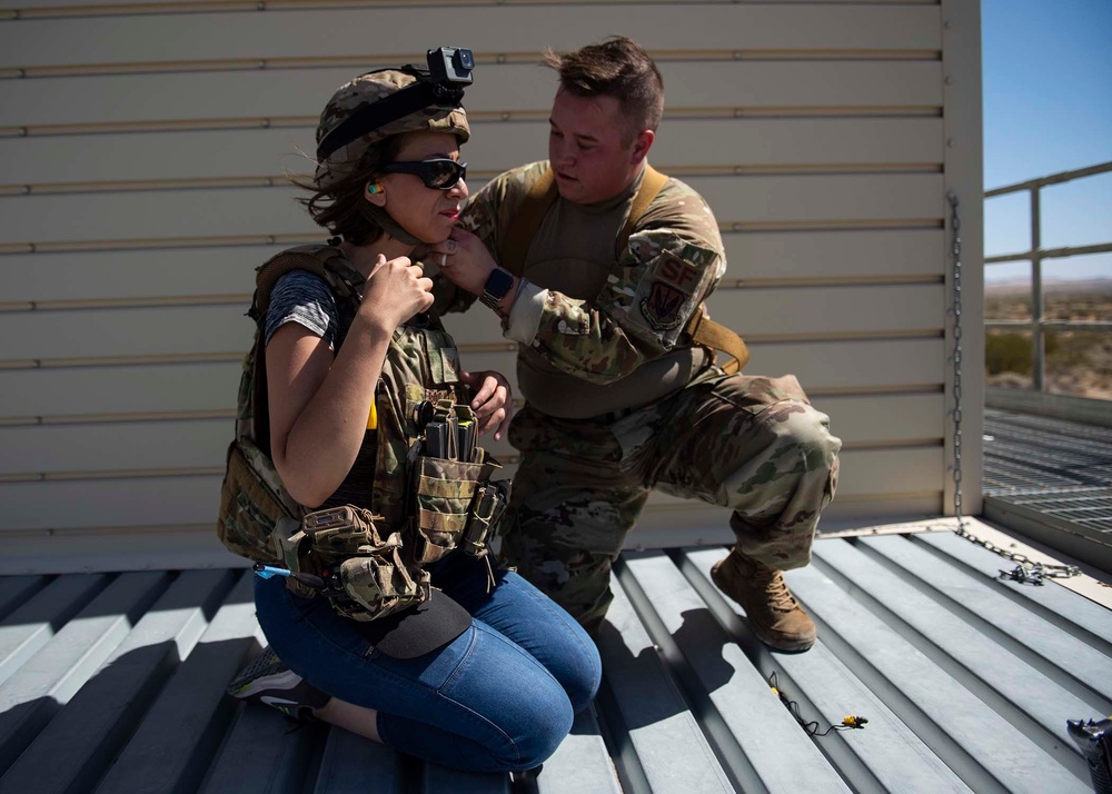 JCOC 91 assist Airmen in base exercise