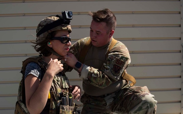 JCOC 91 assist Airmen in base exercise