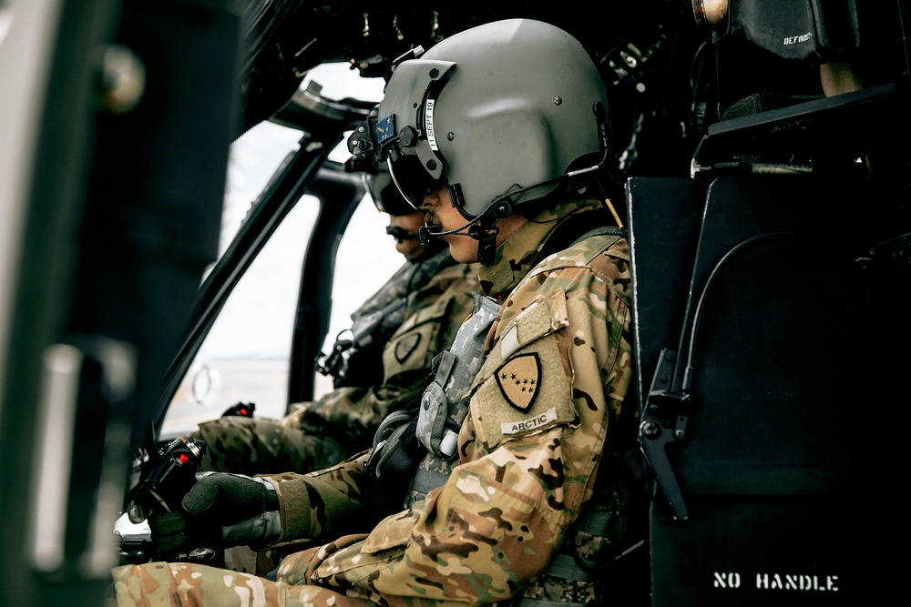 UH-60 Black hawk crew prepares for a flight to support Mertarvik Innovative Readiness Training