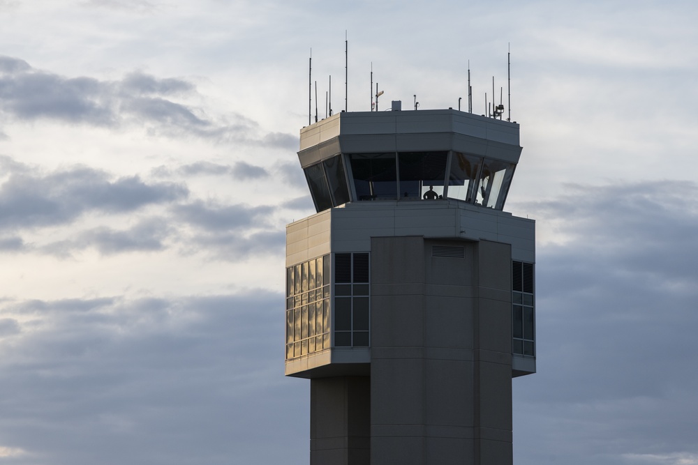Sun slowly sets on Dover AFB air traffic control tower
