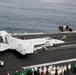 An F/A-18E Super Hornet launches from the flight deck of the Nimitz-class aircraft carrier USS Abraham Lincoln (CVN 72).