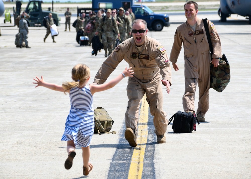 Deployed 143d Airlift Wing Airmen Return on Independence Day