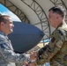 134th Airman gets promoted in front of F-22 Raptor in Hawaii