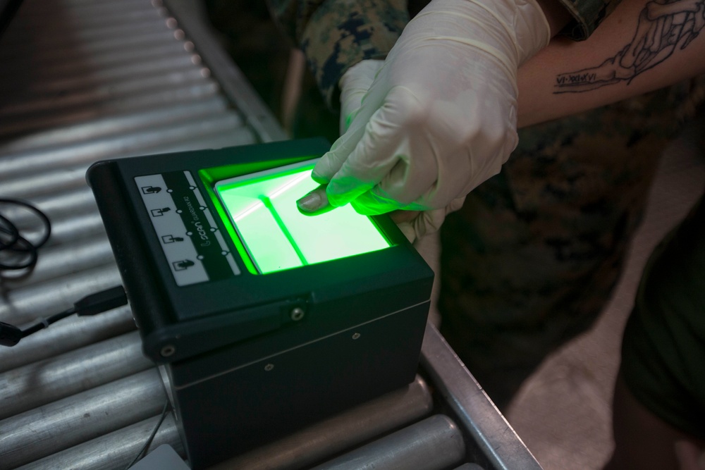 31st MEU Law Enforcement Marines simulate detainee handling aboard USS Wasp