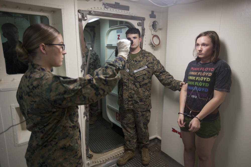 31st MEU Law Enforcement Detachment simulates detainee handling aboard USS Wasp