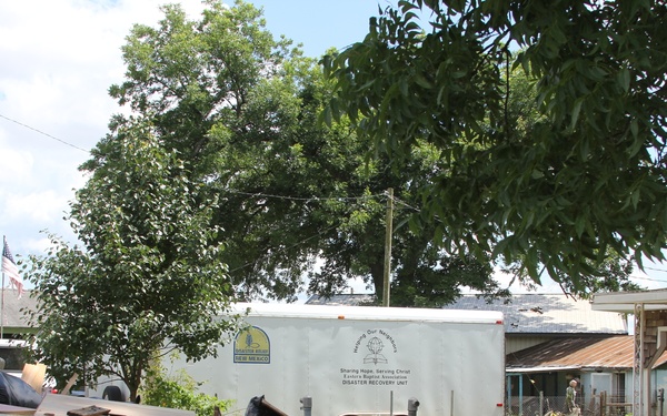 Volunteers Helping Residents After Flood