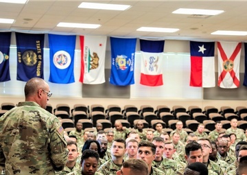 Army Reserve CSM visits with Fort McCoy NCOA students
