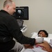 Hospital Corpsman preforms ultrasound