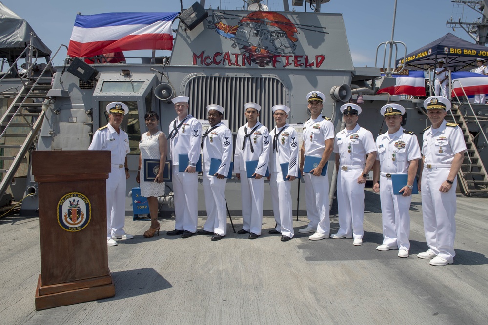 Admiral John Aquilino, Commander U.S. Pacific Fleet and Vice Admiral Phillip Sawyer, Commander, U.S. 7th Fleet poses for a photo during an awards ceremony on USS John S. McCain