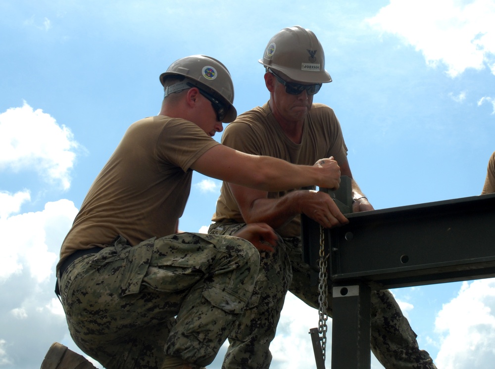 NMCB 1 Builds Medium Girder Bridge