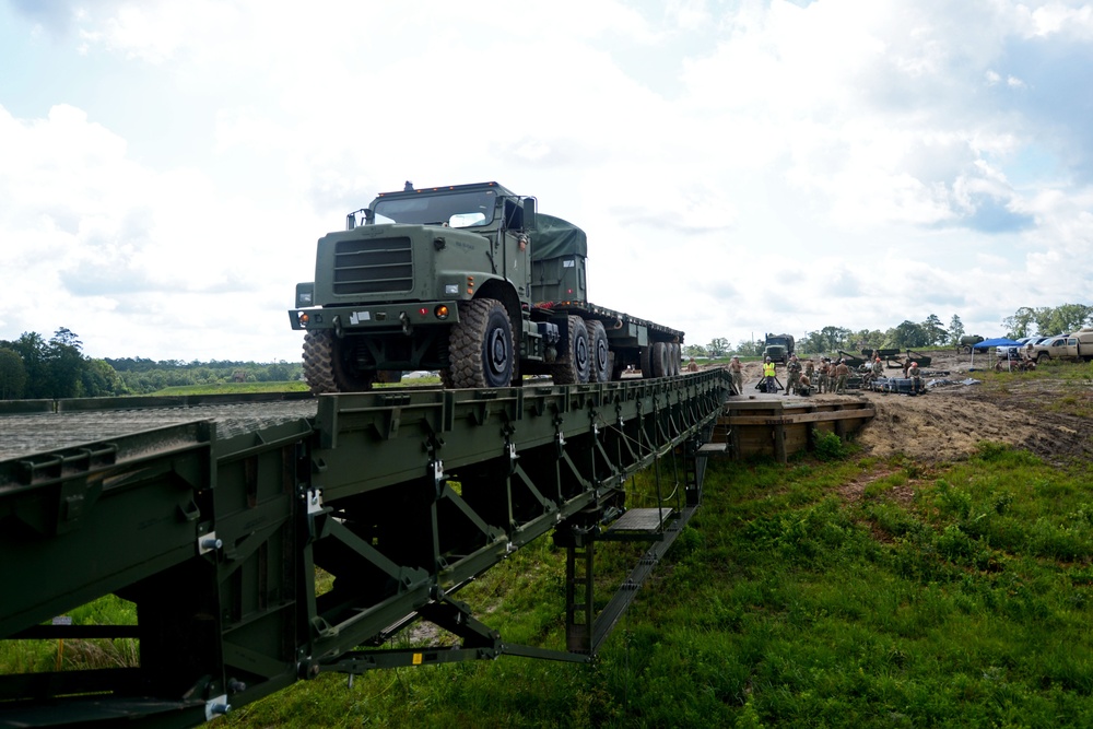 NMCB 1 Builds Medium Girder Bridge