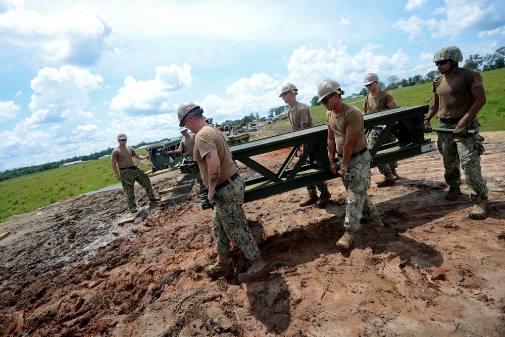 NMCB 1 Builds Medium Girder Bridge