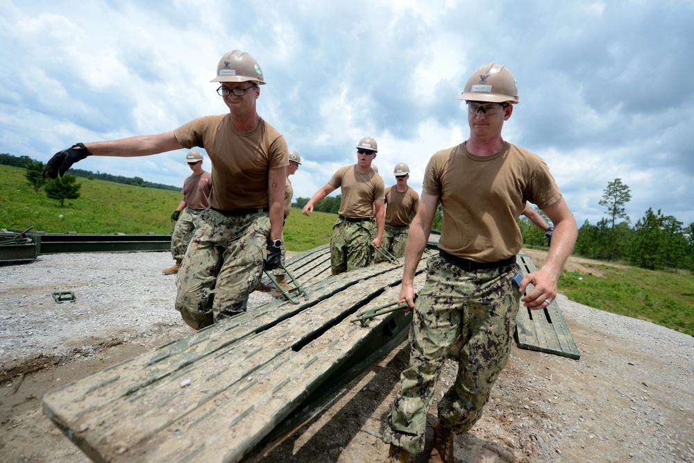 NMCB 1 Builds Medium Girder Bridge