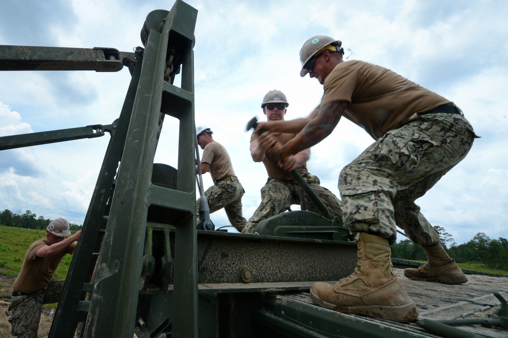 NMCB 1 Builds Medium Girder Bridge
