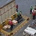 Sailors Unload Supplies On Flight Deck
