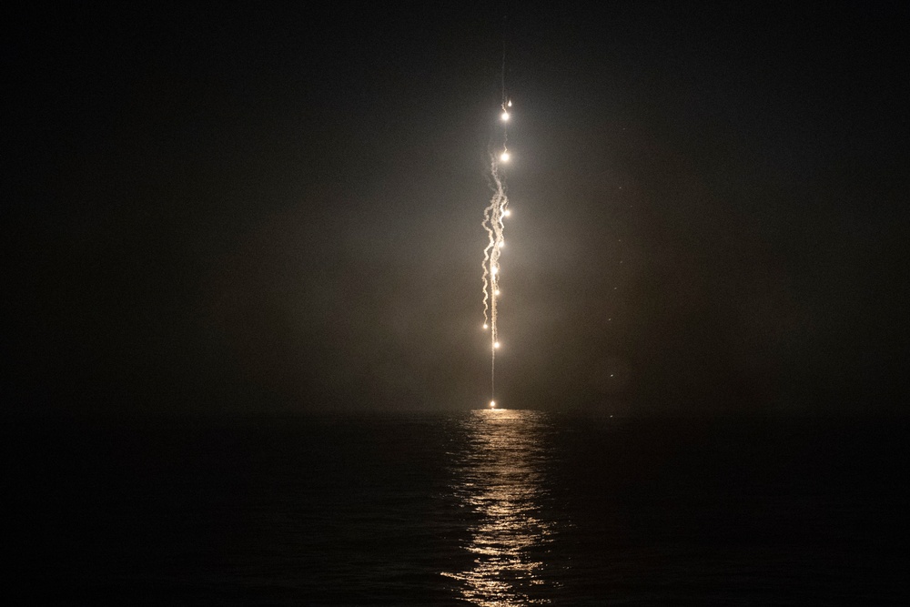 USS MOMSEN Conducts Live Fire at Night