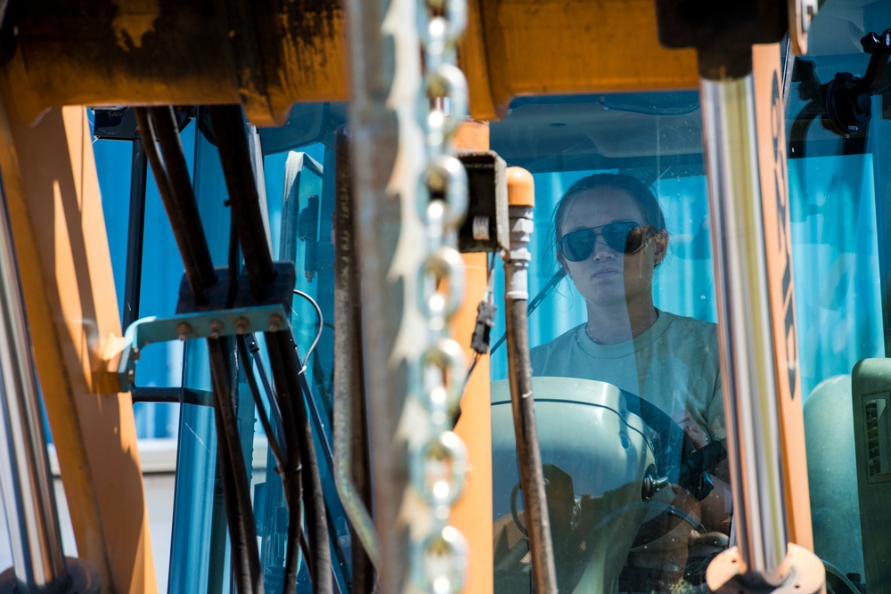 Civil Engineer operates Heavy Equipment