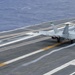 Aircraft Performs Touch And Go Maneuver On Flight Deck