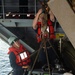 U.S. Sailors operate a rigid-hull inflatable boat