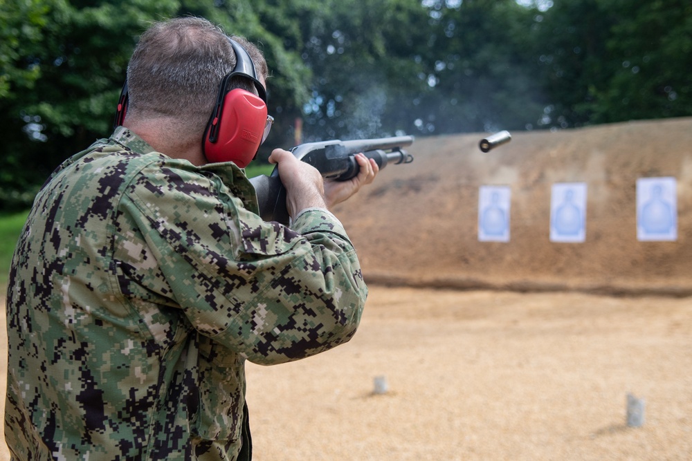 U.S. Sailors attend an M500 shotgun qualification course