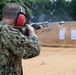 U.S. Sailors attend an M500 shotgun qualification course