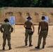 U.S. Sailors attend an M9 pistol qualification course