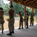 U.S. Sailors attend an M9 pistol qualification course