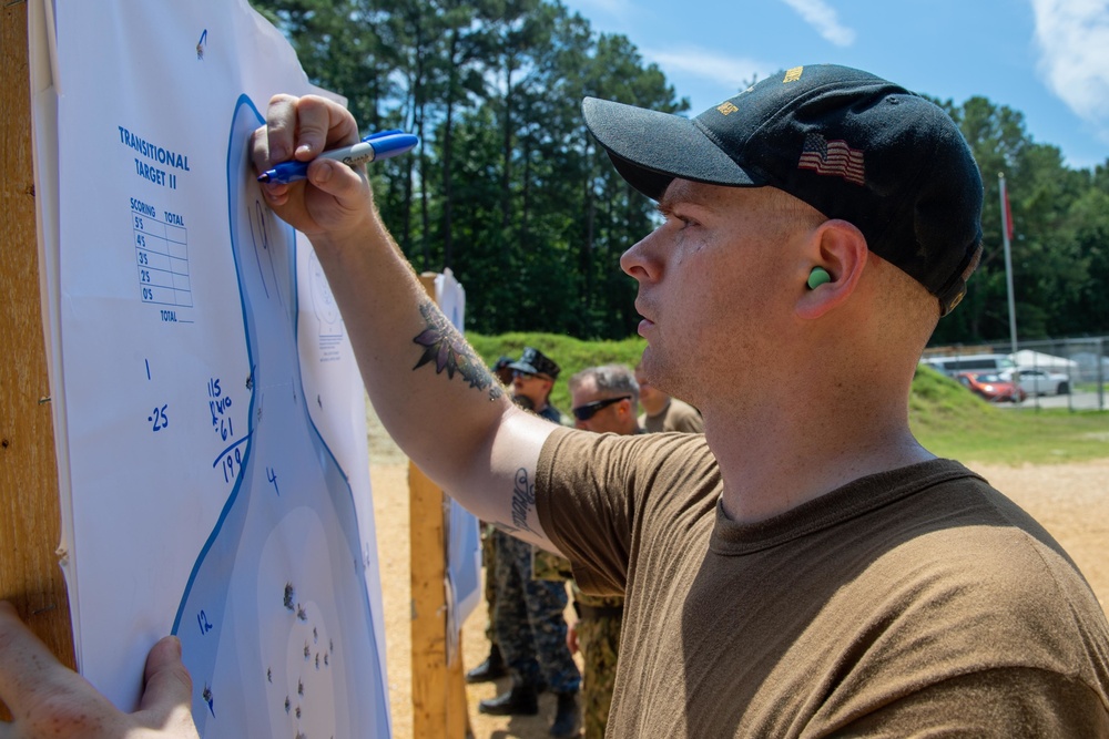 U.S. Sailors attend an M9 pistol qualification course