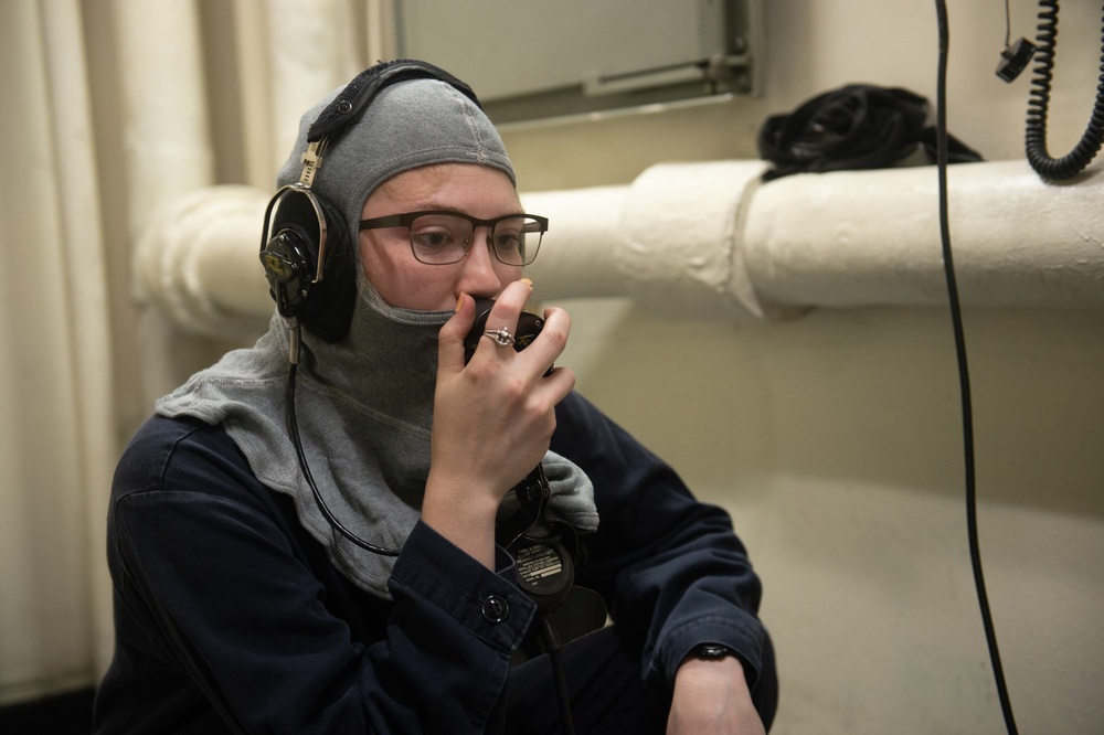 U.S. Sailor participates in a simulated general quarters drill