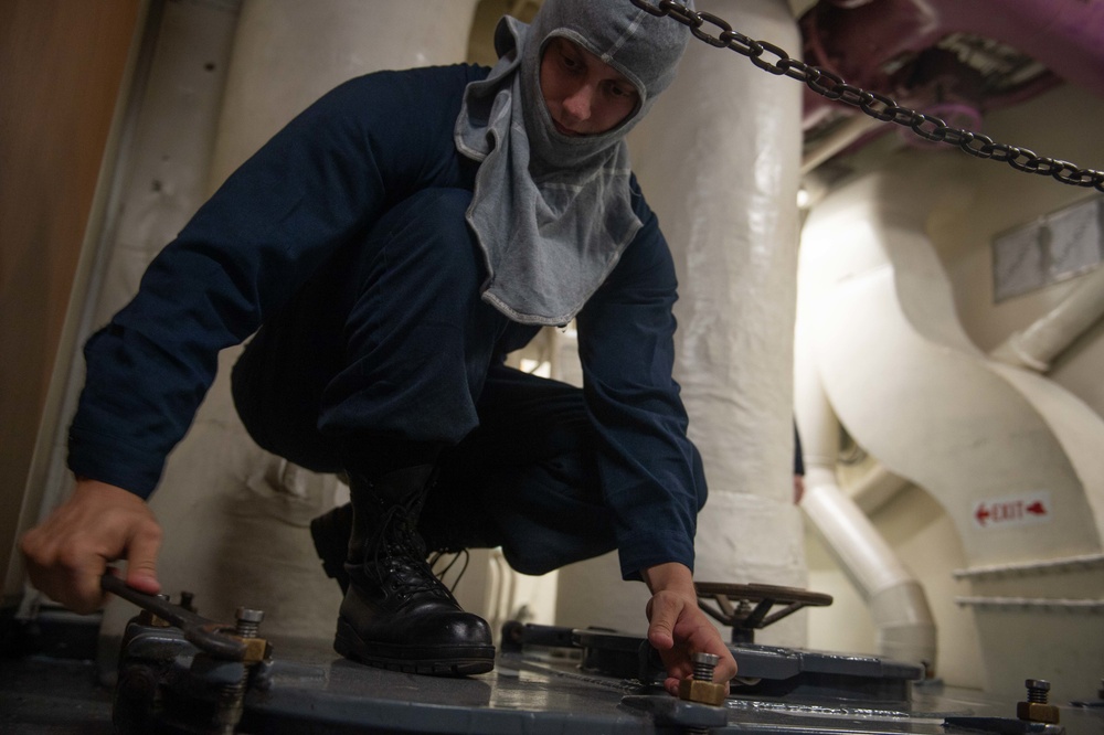 U.S. Sailor participates in a simulated general quarters drill