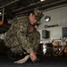 U.S. Sailor cleans a padeye