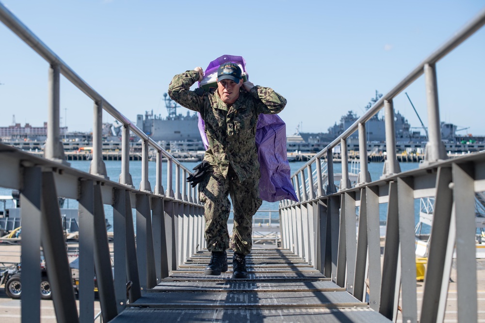 U.S. Sailor hauls mail