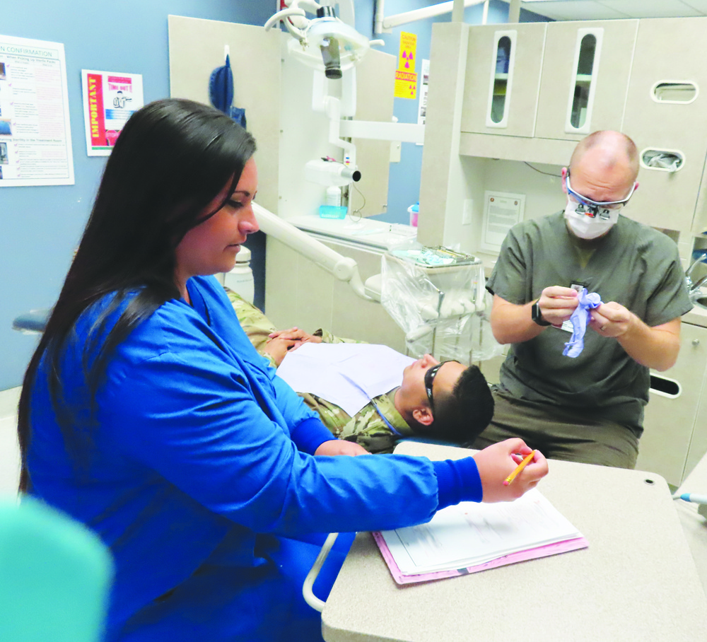 Spouses take bite out of unemployment, become dental assistants