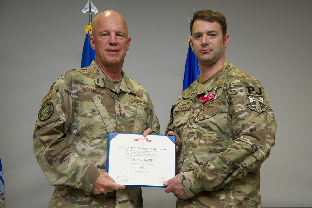 General presents two bronze stars to Reserve Citizen Airman