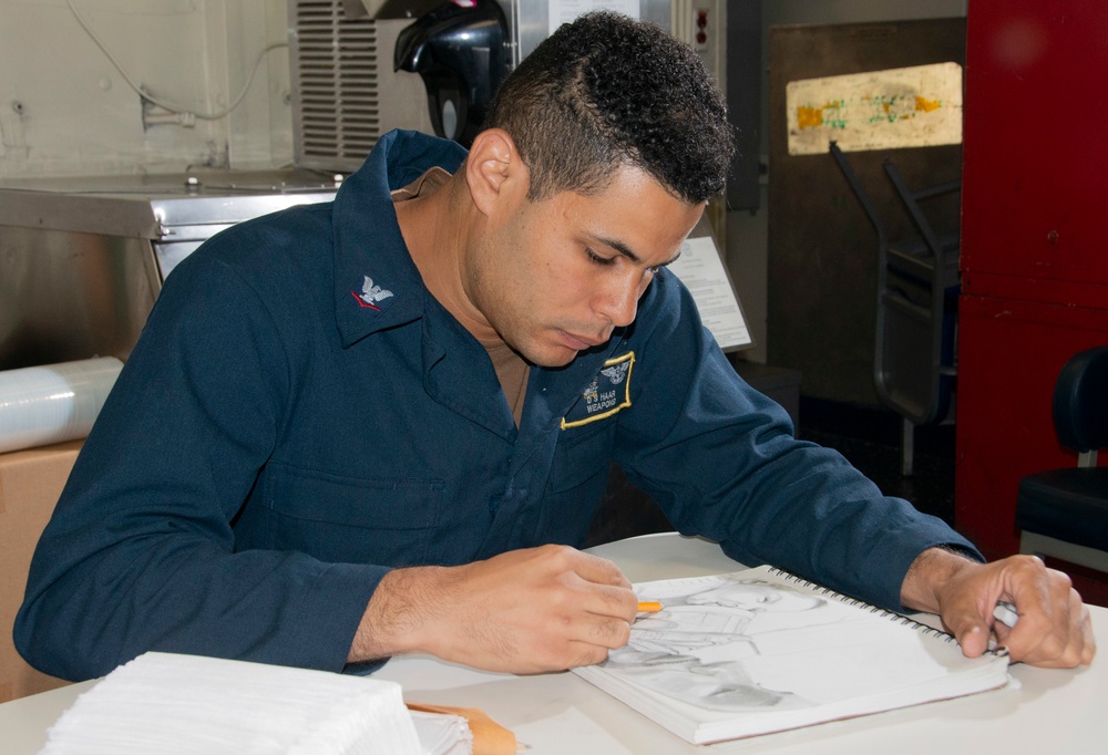 Nimitz Sailor Draws A Portrait
