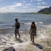 Volunteers remove trash and debris at Makai Research Pier