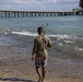 Volunteers remove trash and debris at Makai Research Pier