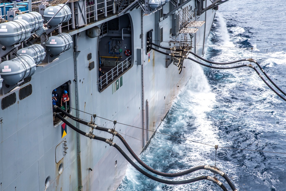 USS Bataan Conducts Replenishment At Sea