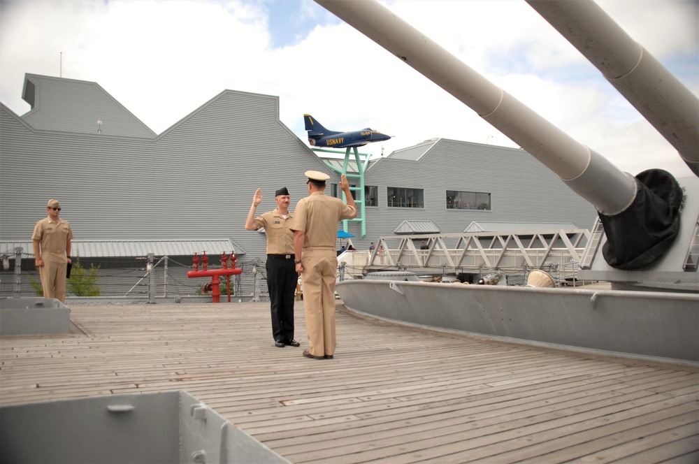 Re-enlistment ceremony aboard a Battleship