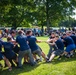 Future Sailors and their recruiters participate in a Family Day event.