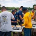 Future Sailors and their recruiters participate in a Family Day event.